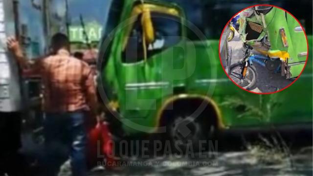 A un pelo de la muerte: Ciclista que iba como ‘colgado’ de una tractomula casi pierde la vida tras ser arrollado por un bus en Girón